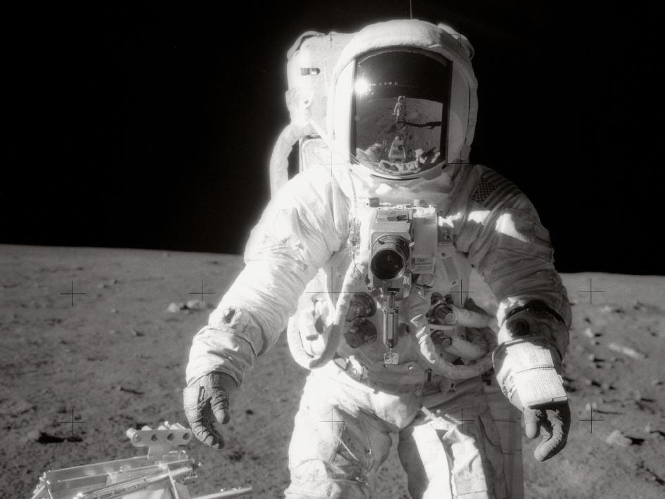 Astronaut Alan L. Bean walks on the moon during Apollo 12.