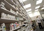 A pharmacist works at a pharmacy in Toronto, January 31, 2008. REUTERS/Mark Blinch