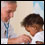 Photo: Healthcare professional with a child.