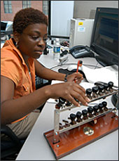 Woman with stamps at Federal Register