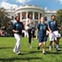 U.S. First Lady Michelle Obama running with kids