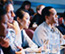 people sitting in an auditorium