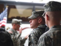 Soldiers standing in line at attention.