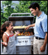 Photo of Dad & daughter grilling outdoors