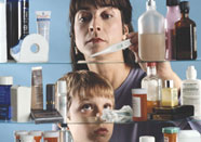 Mother and son looking at medications