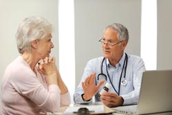 Doctor speaking to a woman