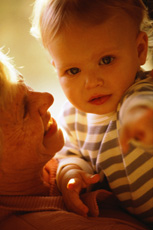 A photograph of a grandmother and infant