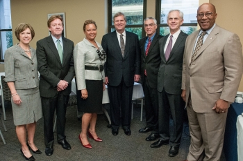 Secretary Bryson, second from right, poses with government and university officials