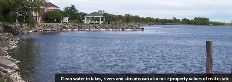 lakefront property with a dock and gazebo