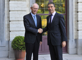 Belgian Prime Minister Herman Van Rompuy welcomes NATO Secretary General Anders Fogh Rasmussen.