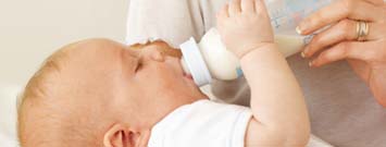 Photo: An infant bottle feeding