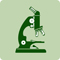 A green icon of a microscope.
