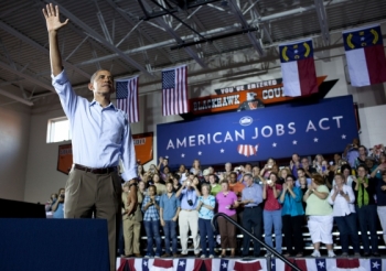 President Barack Obama delivers remarks on the American Jobs Act at West Wilkes High School in Millers Creek, North Carolina, Oct. 17, 2011 (Official White House Photo by Pete Souza) 