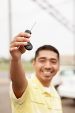 Teenage boy holding a car key