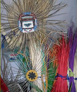 Finely woven Hopi wicker plaques and dyed rabbitbrush and sumac stems.