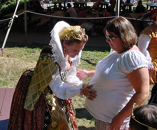 Photo: A pregnant woman at a festival