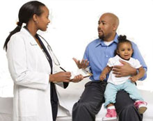 Parent talking with physician