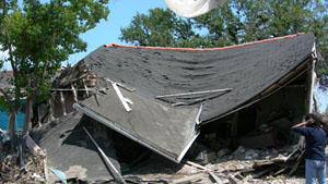 Image of a destroyed home after a hurricane
