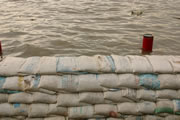 Photo of sandbags holding back flood waters