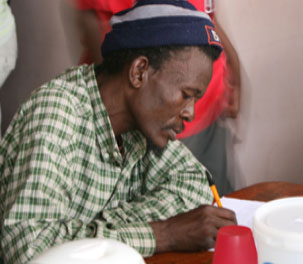 Happy Khomalo, a patient, at CARe’s facility in the church.