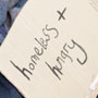 Photo: Sign that reads hungry and homeless
