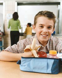 Photo: A young man eating his healthy lunch