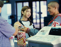 Photo: Two children buying snacks