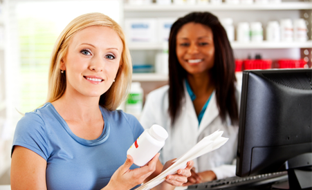 Woman talking to a female pharmacist