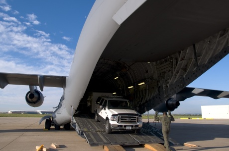 FEMA's Denver MERs load their trucks for transport on board a US Airforce C-17 at Buckley Airforce Base. Photo: Michael Rieger/FEMA 