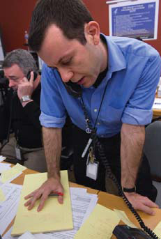 A CDC staff member responding to a call