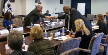Secretary Bryson shakes hands with Joseph Anderson, Jr. Chairman and CEO, TAG Holdings, LLC and Chair of the Manufacturing Council