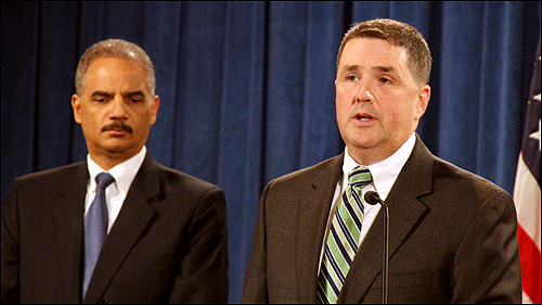 Eric Holder and Kevin Perkins