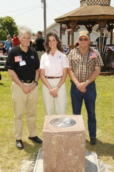 In the photo are (left to right) Dr. Robert Groves, Juliana Blackell & Bob Biram  - Village Chairman.