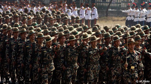 Nepalese army soldiers march during Nepal's National Democracy Day celebrations in Katmandu, Nepal, February 19, 2010. [AP Photo]
