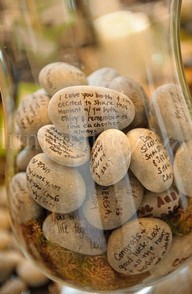 Guestbook idea. :)    Have them sign river stones with little notes so you can later place in a vase or jar at home for display. Better than a book collecting dust.  - Neat!