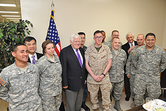 Secretary Locke, Congressman McDermott and Congressman Reichert with U.S. service men and women from Washington State