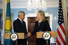 Secretary Clinton Shakes Hands With Kazakh Foreign Minister Idrissov