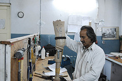 Man building a prosthetic leg