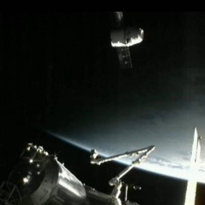 Photo: The SpaceX Dragon capsule has arrived at a planned 30-meter hold point beneath the International Space Station. A “go” has been given to proceed inside 30 meters to a final planned hold point and capture point of 10 meters. The scheduled grapple time is 7:22 a.m. EDT Watch it live on www.nasa.gov/ntv