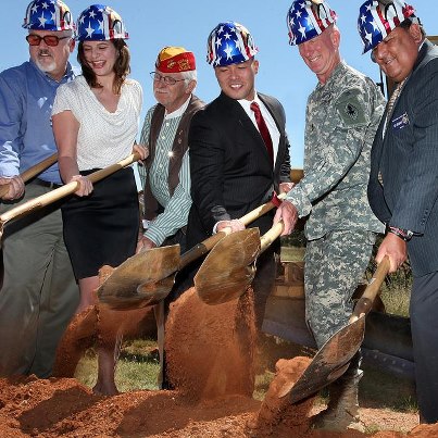 Photo: The Department of Veterans Affairs awarded 18 grants in fiscal year 2012 totaling $47,462,135 to 15 states and one tribal government to establish new Veterans cemeteries and to expand or improve others. 
The awards will fund a new state cemetery in Louisiana and a new tribal cemetery in South Dakota. Expansion and improvement grants to 10 states will extend the life of existing cemeteries. Six states will receive cemetery operations and maintenance grants that will help those cemeteries reach national shrine standards of appearance. 
In the photo, Veterans Cemetery Grants Service director Josh de Leon (third from right) helps break ground for the Southern Arizona Veterans Memorial Cemetery in Sierra Vista, Ariz., on Sept. 17, 2012. From left to right: Rick Mueller, mayor of Sierra Vista; Britann O’Brien, Office of the Governor; William Pakinkis, Marine Corps League; Joshua de Leon; Maj. Gen. Gregg C. Potter, commanding general Fort Huachuca; and Joey Strickland, Arizona Department of Veterans’ Services. Photo by Beatrice Richardson of the Sierra Vista Herald. 
For further details, see the official VA news release here: http://www.va.gov/opa/pressrel/pressrelease.cfm?id=2396.