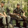 Photo: Members of the 3rd Infantry in 1987. The soldier on the left is wearing the OG-107 tropical combat uniform authorized for wear until the woodland camouflage Battle Dress Uniform as worn by the soldier on the right could be fielded.