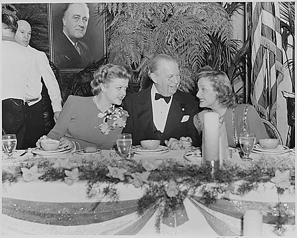 Happy Birthday Angela Lansbury - October 16, 1925

Photograph of movie stars Angela Lansbury, Charles Coburn, and Constance Moore, seated at a table during a Roosevelt Birthday Ball function in Washington, with a portrait of the late President in the background., 01/28/1946

via US National Archives on Facebook