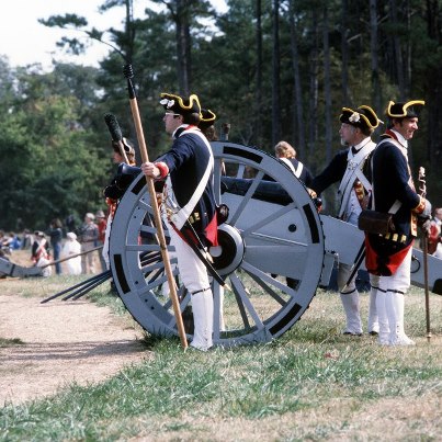 Photo: On this day in 1781, American and French troops, backed by a French fleet began the siege of Yorktown, Virginia during the American Revolution. The siege would last until October 19, 1781 when British commander General Lord Cornwallis surrendered the British force which effectively ending the American Revolution. This photograph was taken in 1981 during the bicentennial celebration of the battle. The photograph is of Members of Britain's Fourth Royal Artillery Unit, dressed in Revolutionary War uniforms, demonstrate cannon firing at the Yorktown Bicentennial Celebration, 10/16/1981 ARC Identifier 6365195 Item from Record Group 330: Records of the Office of the Secretary of Defense, 1921 - 2008