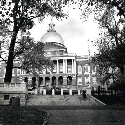 Photo: The Massachusetts State House the state capitol and house of government of the Commonwealth of Massachusetts, located in the Beacon Hill neighborhood of Boston.  The building houses the Massachusetts General Court (state legislature) and the offices of the Governor of Massachusetts. One of the most striking aspects of the Massachusetts State House is the unusual golden dome, the original wood dome, which leaked, was covered with copper in 1802 by Paul Revere's company. This photograph of the State House was taken in 1962 when the building was being renovated as a fallout shelter by the Army Corps of Engineers. RG 077, U.S. Army Corps of Engineers, Construction Project Photographs.