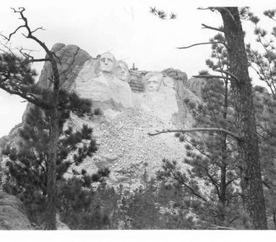 Photo: On October 4, 1927, sculpting began on the face of Mount Rushmore in the Black Hills National Forest in South Dakota. These pictures are from the collection of the National Archives and show some of the sculpting in progress. 

[South Dakota Projects, 1917-1949]: Mount Rushmore National Monument, 05/1939  ARC Identifier 5604046 Item from Record Group 30: Records of the Bureau of Public Roads, 1892 - 1972
