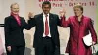 Date: 10/16/2012 Description: U.S. Secretary of State Hillary Rodham Clinton, left, Peru's President Ollanta Humala, center, and Michelle Bachelet, Chile's former president and U.N. women executive director, pose for photos at the opening of a conference on women's empowerment in Lima, Peru, Tuesday, Oct. 16, 2012.  © AP Image