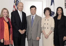 Secretary Locke (center) with participants. Click for larger image.