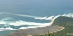 Tsunami tidal waves slamming into the coast