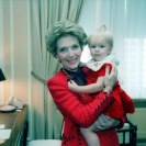 Photo: Who is Mrs. Reagan holding?