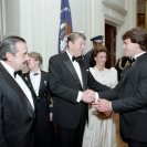 Photo: Who is shaking hands with President Reagan?